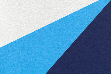 Fototapeta premium Old craft white, cerulean and navy blue color paper background. Vintage abstract cardboard with gradient