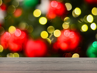 The empty table wooden board in front of the background is blurred. Brown wood perspective in christmas celebrations - can be used to display or montage your products. Mock up for product display.