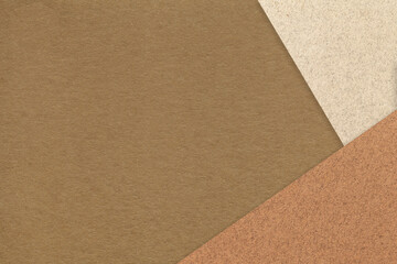 Texture of dark brown craft color paper background with beige and umber border. Vintage abstract coffee cardboard.