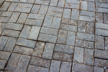 Close-up of paving slabs floating after winter