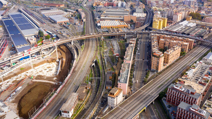 Aerial view on a junction of the east ring road in Rome, Italy. There is traffic and lots of cars...