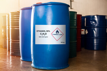 Blue drum size 160 kg of ethanol 95 percentage with the label of flammable liquid show caution for...