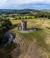 An aerial view of charnian rock outcrops and Old John folly in Bradgate Park, Leicestershire, UK, in Autumn