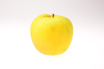 fresh yellow apple isolated on white background