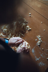 A woman is preparing cookie dough