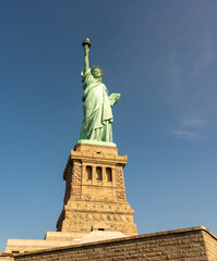 Fototapeta na wymiar Magnificent view the Statue of Liberty on the pedestal