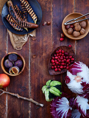 Top view seasonal vegetables and fruits, healthy vegetarian ingredients for cooking a dinner on a wooden background