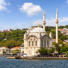 View from Bosphorus Strait overlooking Ortakoy Mosque, or Ortakoy Camii, aka Buyuk Mecidiye Camii, suited at the waterside of the Ortakoy pier square, Istanbul, Turkey