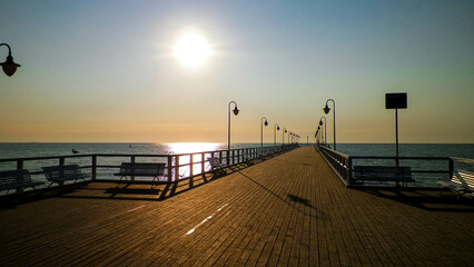 Fototapeta na wymiar Sunrise over pier in Gdynia, Poland.