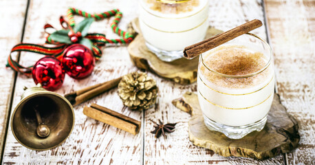 winter drink made with eggs, liqueur and cinnamon, called eggnog, coquito or Auld Man's milk