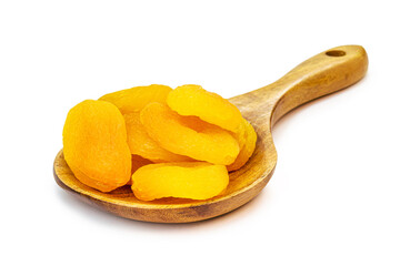 dried and dried apricot made in brazil in rustic wooden spoon, isolated white background.
