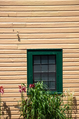 exterior window on a vintage wooden cottage