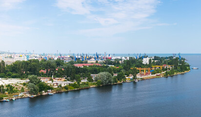 Fototapeta na wymiar Aerial summer view of Varna harbor with port cranes and buildings
