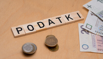 Inscription Podatki which means Taxes. Concept showing Taxes in Poland