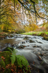 Robbers Bridge in Exmoor National Park in autumn