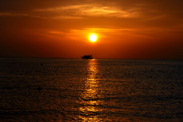 Naklejka na ściany i meble Orange sunset on the Red Sea, Egypt