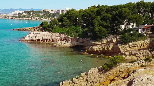Beautiful landscape of rock formations on the La Pineda beach in Salou Spain.