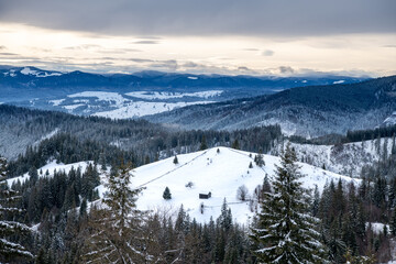 Fototapeta na wymiar Carpathian, Romania, 2021-12-29. Beautiful romanian landascape under the snow.