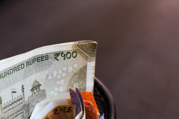 500 rupees note kept in basket with pens. Indian Currency