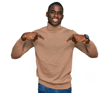 Young african american man wearing casual winter sweater looking confident with smile on face, pointing oneself with fingers proud and happy.