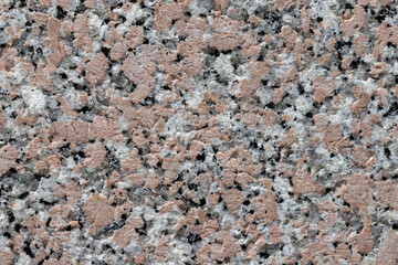 Texture of granite stone wall, close up abstract background