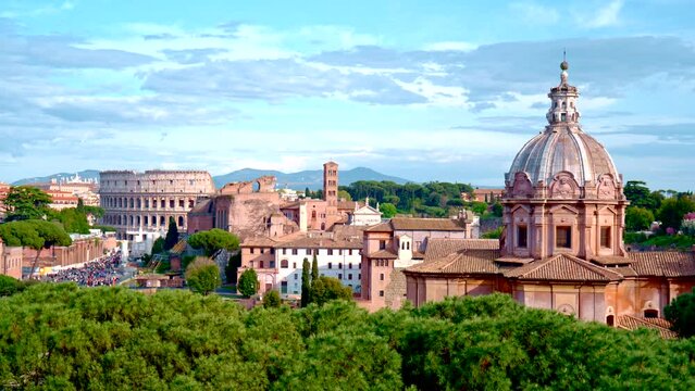 The Colosseum panorama, Colosseo, iconic amphitheatre Arena in the centre of the old town of Rome, Roma, just east of the Roman Forum. RAW cinematic footage