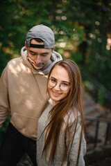 High angle view on young cheerful smiling woman with her boyfriend