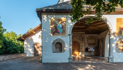 Fototapeta na wymiar The Church of St. Maria Assunta in the Pieve Park - Cavalese, Fiemme valley, Trento district, Dolomites, Trentino Alto Adige, Italy, Europe - Juli 13, 2022