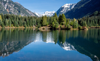 Cascade range at Gold Greek Pond with water reflection