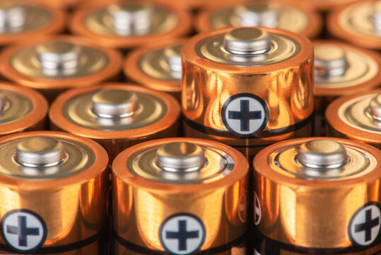 Alkaline battery size AA close-up, with positive ends