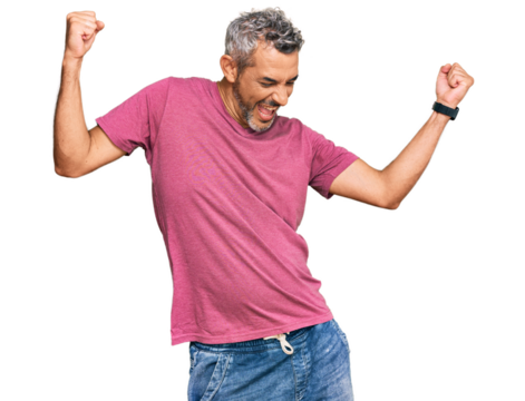 Middle age grey-haired man wearing casual clothes dancing happy and cheerful, smiling moving casual and confident listening to music