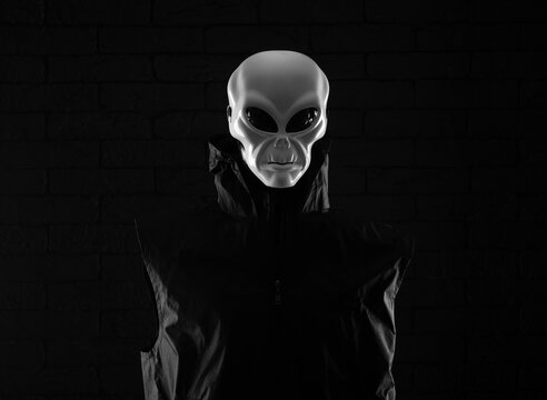 portrait of an alien on a black background