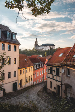 View of houses and the Easter Castle in the background in Weida, Germany