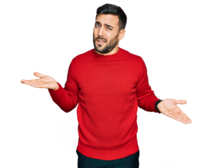 Young hispanic man wearing casual clothes clueless and confused with open arms, no idea concept.