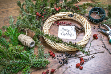 Christmas wreath with calligraphy postcard