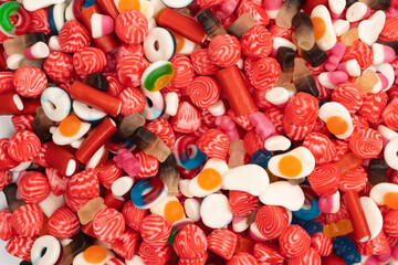 Fototapeta na wymiar Tasty mix of jelly colorful candies isolated on a white background.