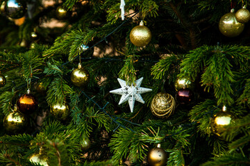 Beautiful toys on the Christmas tree in the New Year holiday,close-up
