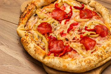 Pepperoni pizza on cutting board