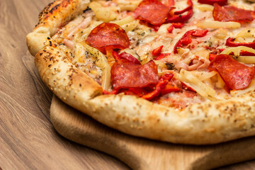 Pepperoni pizza on cutting board