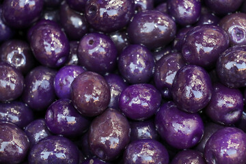 purple olives marinated with blueberries and flavored