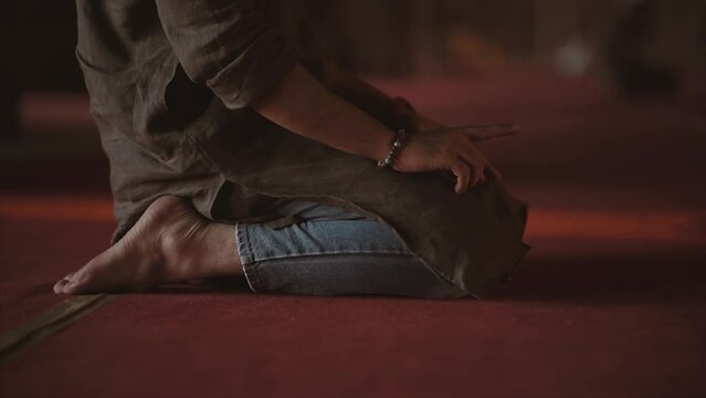 person praying salat in mosque