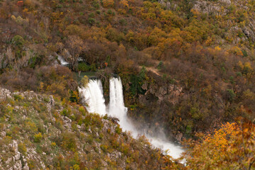 Fototapeta na wymiar The tallest waterfall in Krka national park. Manojlovac waterfall or Manojlovački slapovi in autumn, Croatia. 