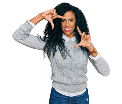 Middle age african american woman wearing casual clothes smiling making frame with hands and fingers with happy face. creativity and photography concept.