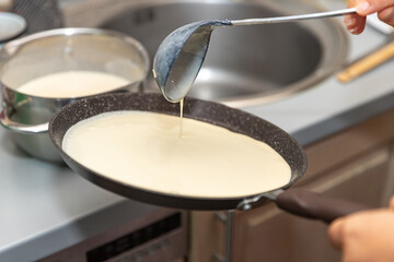 The process of cooking pancakes at home