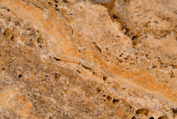 Natural travertine scabos texture background. Traventine stone slab. Large photography.