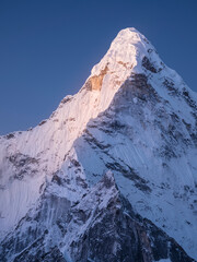 tall snow peak Islandpeak in Nepal in first twilight light