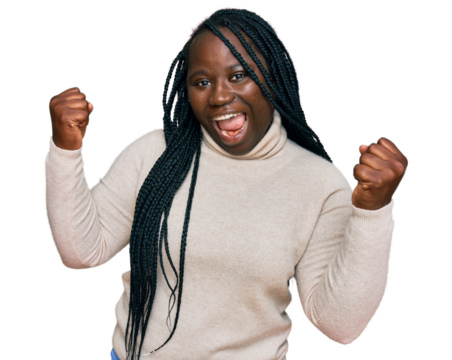 Young black woman with braids wearing casual winter sweater screaming proud, celebrating victory and success very excited with raised arms