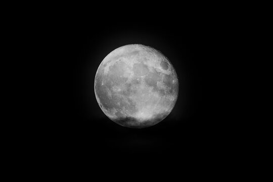 Full moon on dark sky