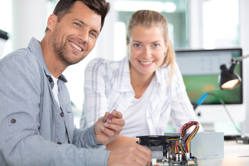 Obraz premium portrait of male and female computer technicians