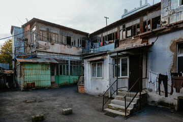 Fototapeta na wymiar Ghetto, slum district, old housing